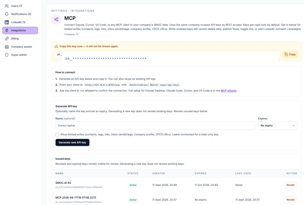 SMOC Console Settings → Integrations → MCP, with optional name and expiry, a one-time copy banner, and the issued-keys list